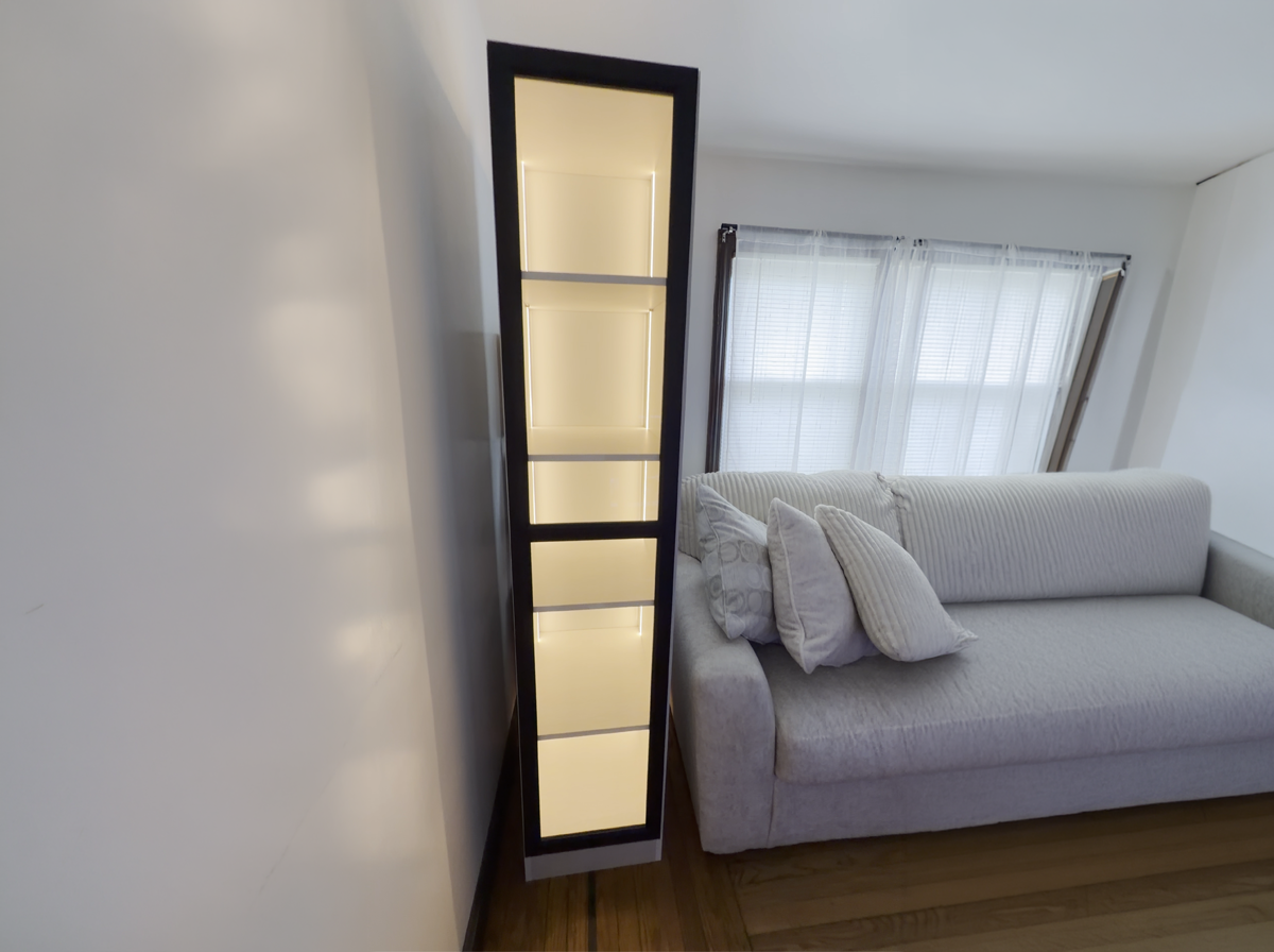 Custom standalone illuminated shelving unit